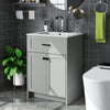 Gray bathroom vanity unit with ceramic basin, two doors, and sleek handles for elegant storage and organization.