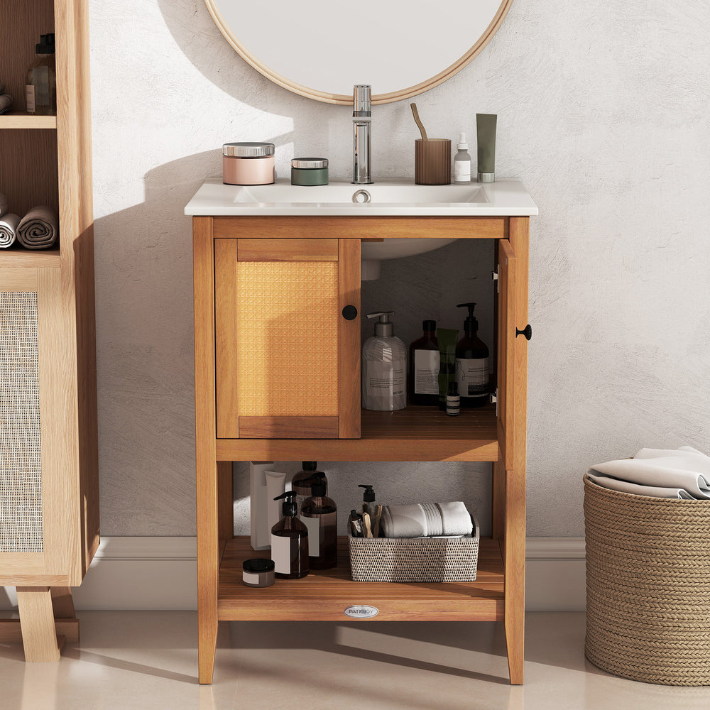 Bathroom vanity with ceramic sink, rattan doors, and slatted shelf, crafted from acacia wood for stylish storage.