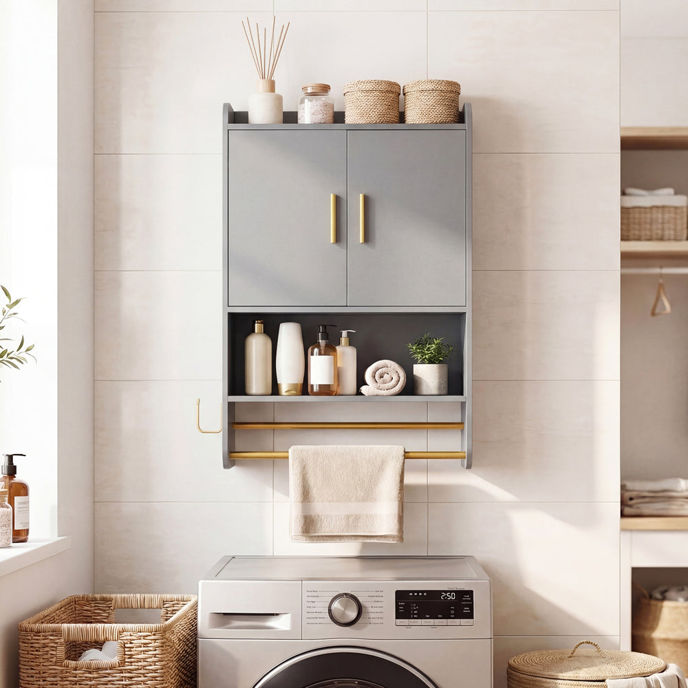 Wall-mounted grey bathroom cabinet with towel bars, featuring two doors and open shelves for storage.