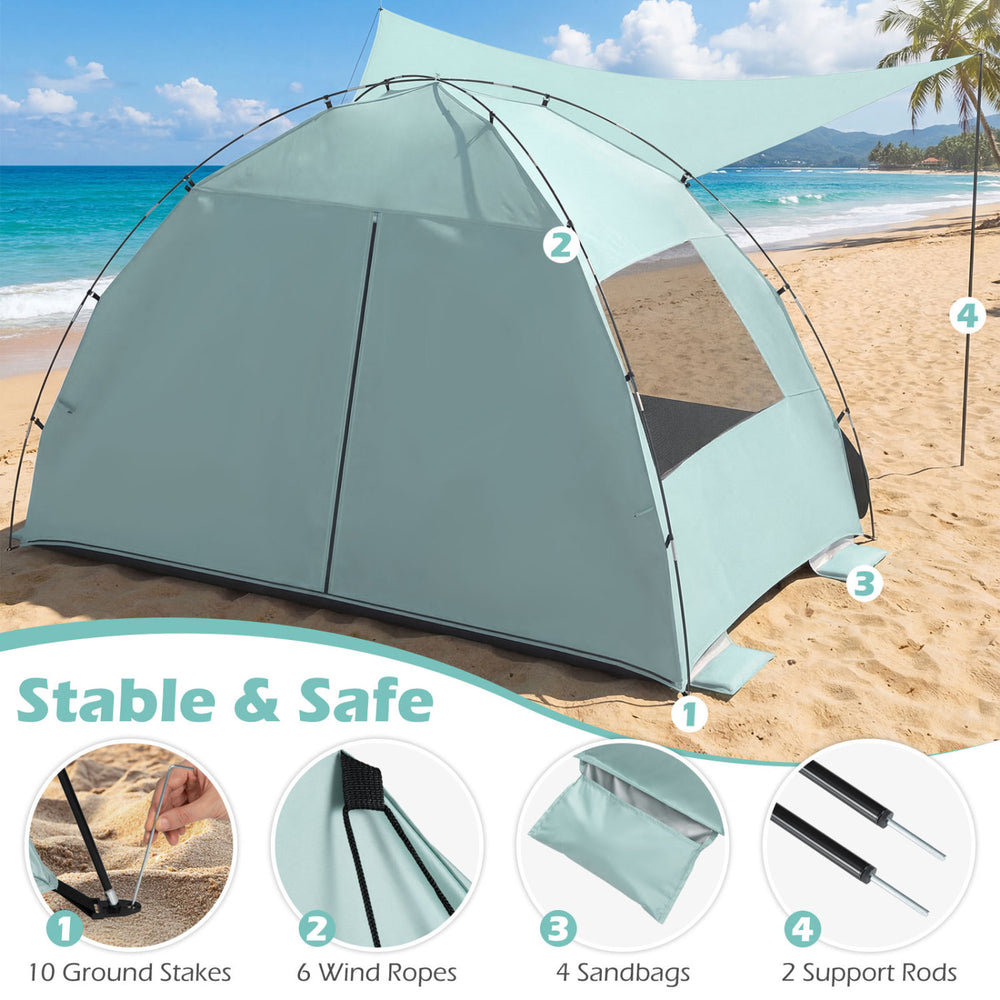 Beach tent sun shelter in green with extended canopy, spacious interior, and UPF50+ protection for family comfort.