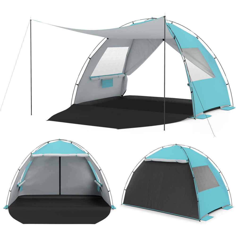 Beach tent sun shelter in blue with extended floor, windows, and spacious interior for 3-4 people, ideal for family.