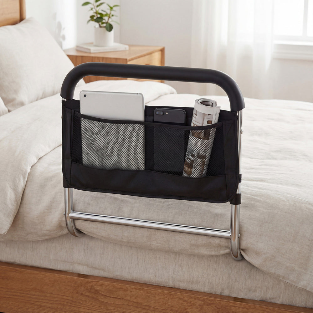 Bed assist safety rail with adjustable height, padded handrail, and mesh pocket for convenient storage beside the bed.