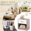 Light gray bedside table nightstand with drawer and open shelf, perfect for bedroom or living room use.