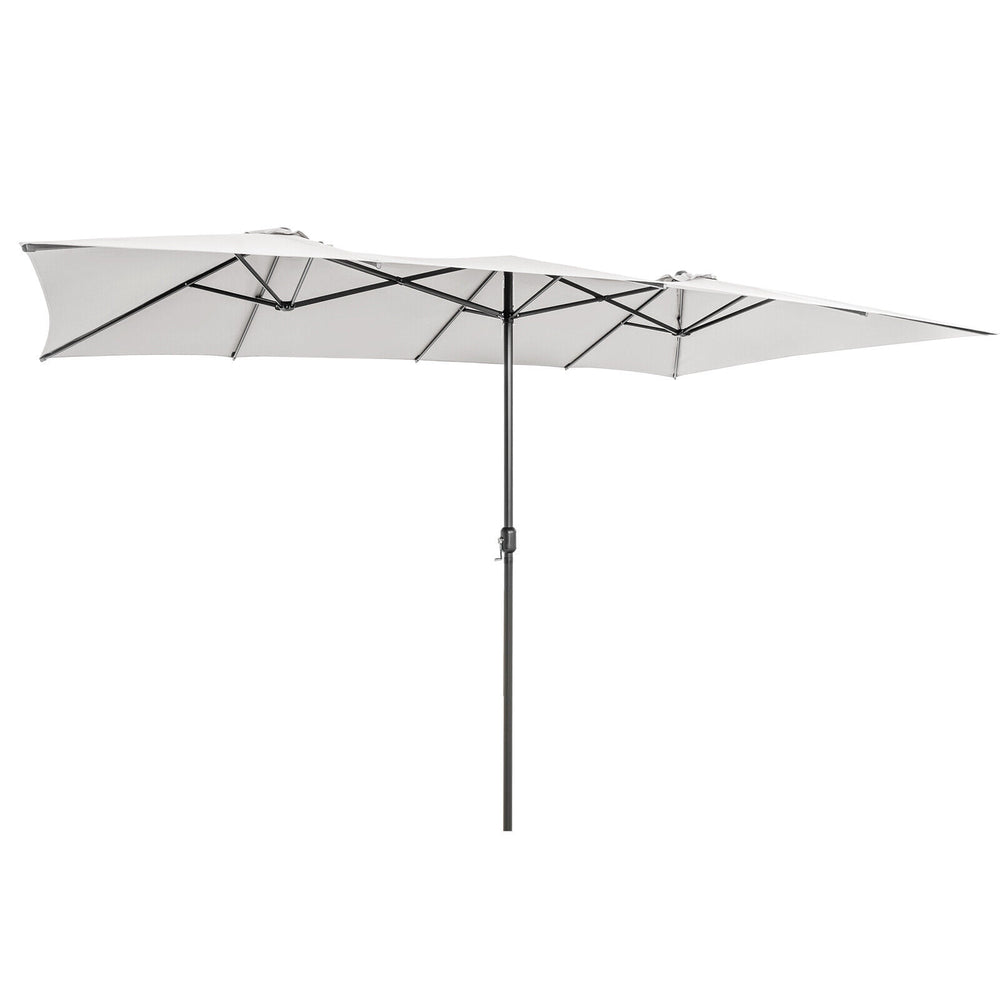 15 feet double-sized patio umbrella in beige with a crank handle and vented tops for outdoor furniture coverage.