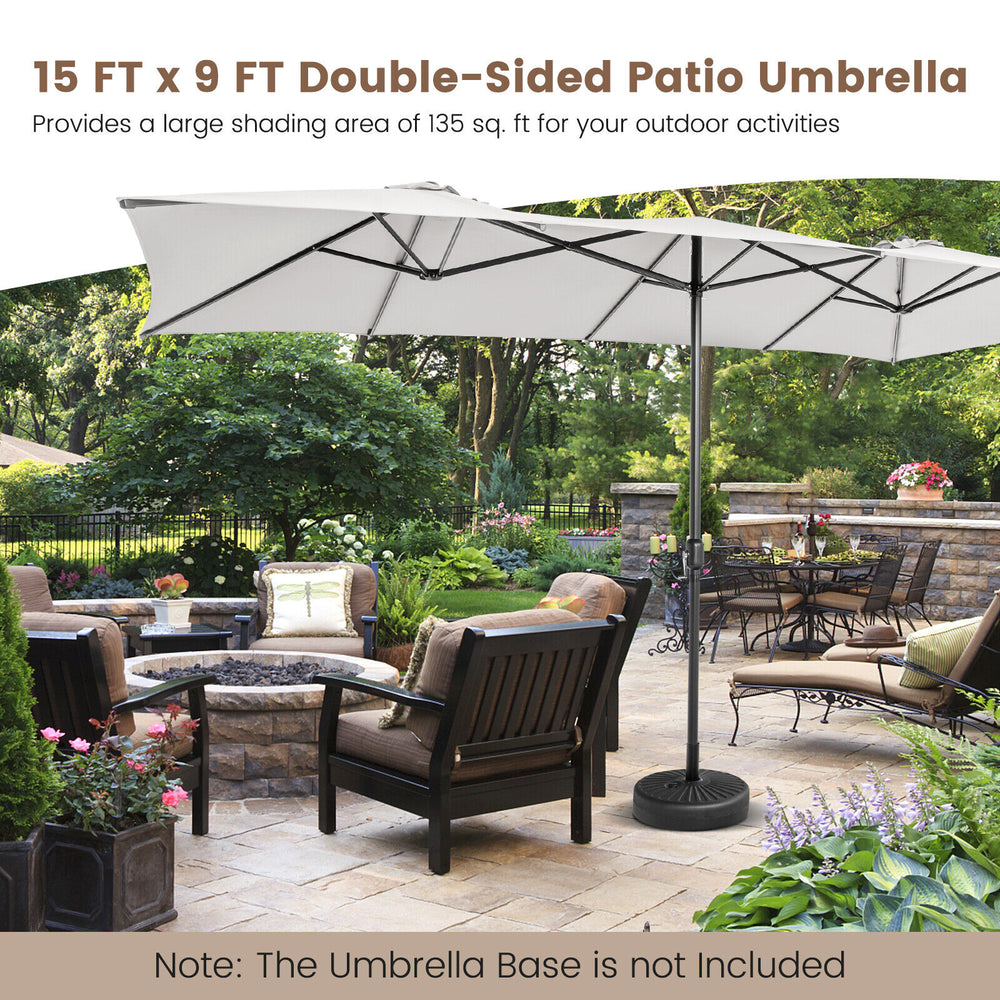 15 FT double-sided patio umbrella in beige with crank handle, providing ample shade for outdoor furniture.