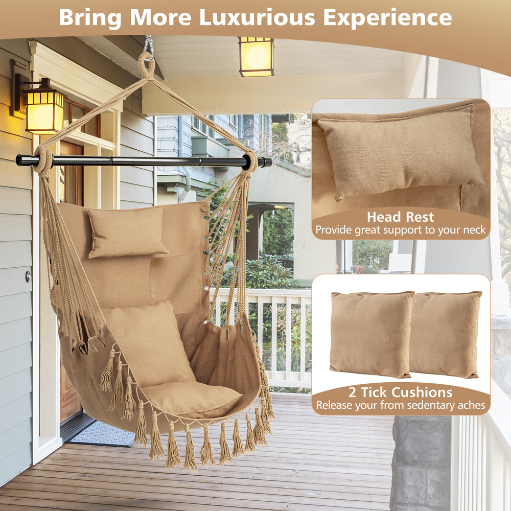 Hanging rope swing chair in beige with soft pillow and cushions, perfect for indoor or outdoor relaxation.