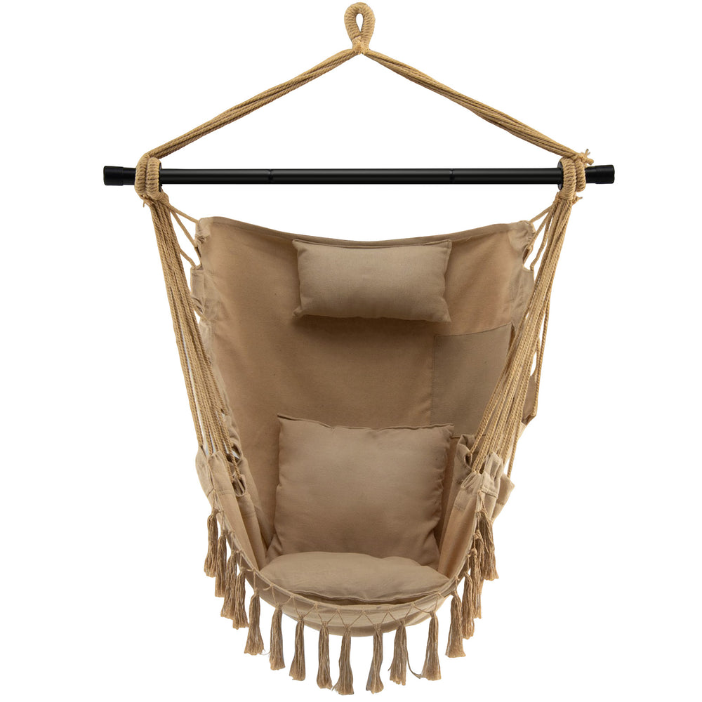 Close-up of the hanging rope swing chair in beige, showcasing soft cushions and stylish tassels for added comfort and.
