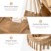 Hanging rope swing chair in beige with soft pillow, cushions, and elegant tassels, perfect for outdoor relaxation.