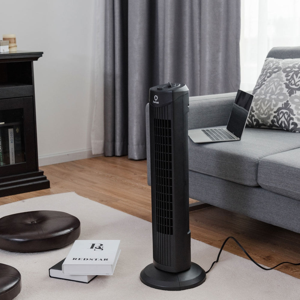 28-inch black bladeless oscillating tower fan with 3 speed settings, designed for quiet and efficient cooling in small.