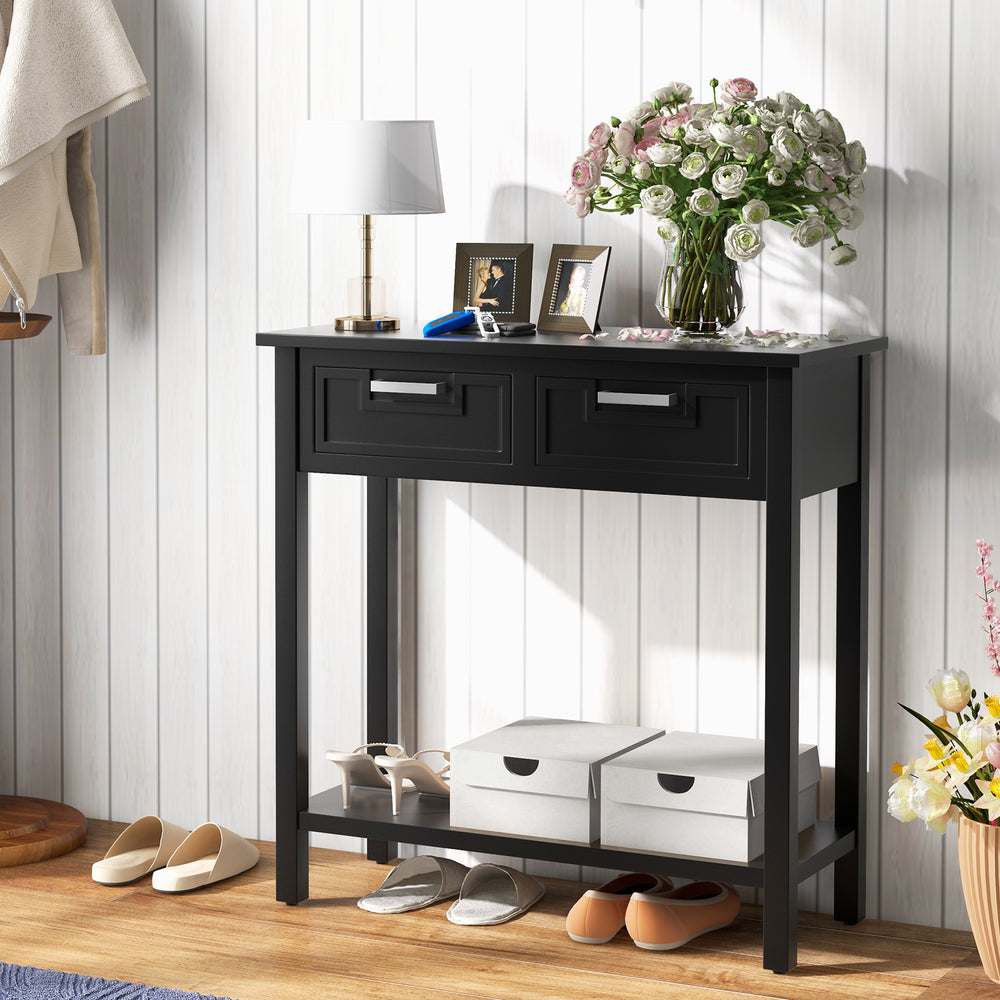 Narrow black console table with two drawers and open storage shelf, ideal for foyer or living room organization.