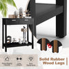 Narrow black console table with solid rubber wood legs, two drawers, and open shelf for versatile storage and decor.