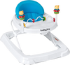 Side view of the blue adjustable height baby walker, showcasing the sturdy wheels and large plastic tray for snacks and.