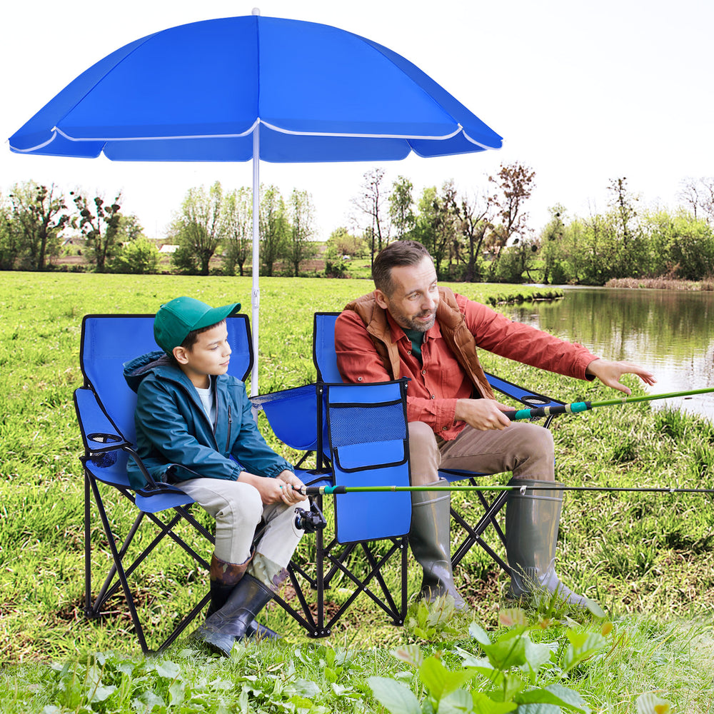 Portable folding picnic double chair with blue umbrella, featuring side pockets and cup holders, ideal for outdoor use.
