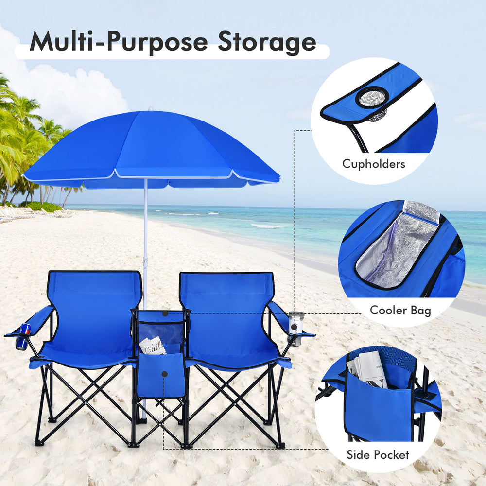 Portable folding picnic double chair set in blue with umbrella, cup holders, and storage pockets for outdoor use.