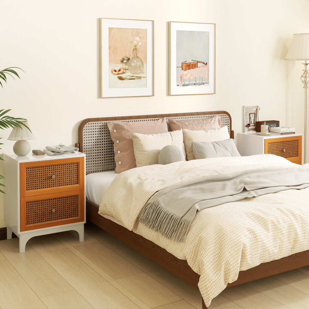 Boho accent nightstand with handwoven rattan drawers, solid wood legs, and a spacious tabletop for stylish storage.