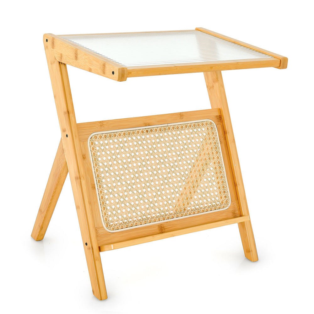 Boho end table showcasing a spacious tempered glass top and stylish rattan magazine rack, perfect for modern decor.