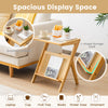 Boho end table with tempered glass top and magazine rack, featuring a spacious design and natural bamboo frame.