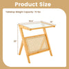 Boho end table with a natural bamboo frame, tempered glass top, and magazine rack, ideal for stylish living spaces.