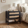Boho rattan nightstand in black features two drawers and an open shelf for versatile storage beside your bed.