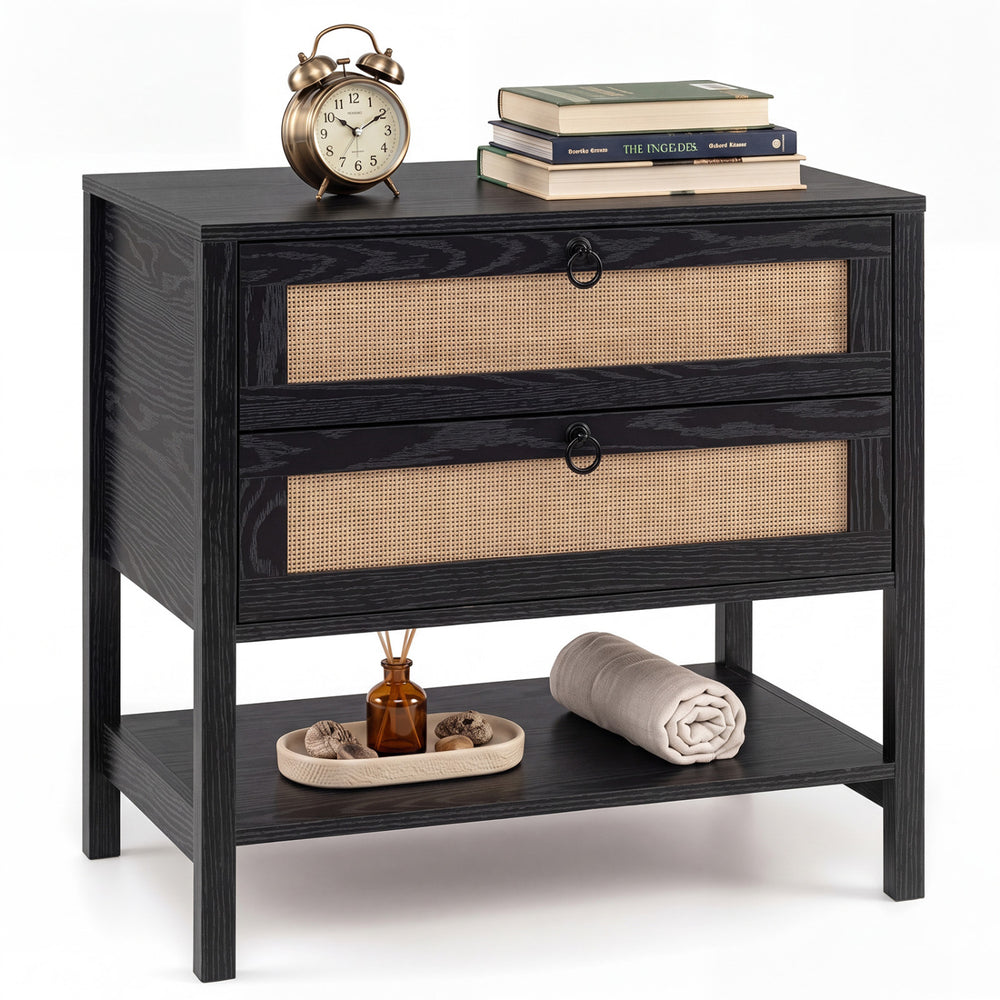 Boho rattan nightstand in black features two drawers and an open shelf for versatile storage and stylish decor.