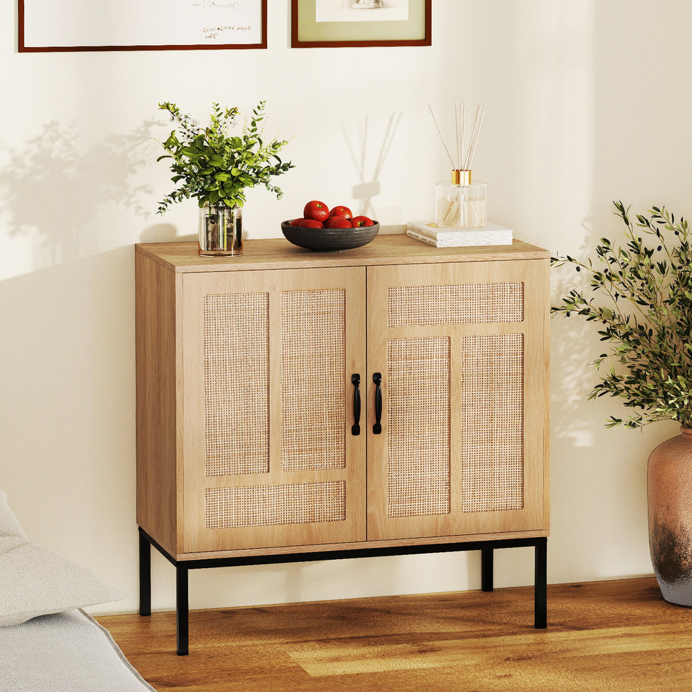 Boho storage cabinet with natural rattan doors and asymmetrical patterns, perfect for kitchen organization and decor.