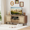 Boho TV stand with natural finish, PE rattan doors, and spacious storage for 60-inch TVs in a stylish living room setup.
