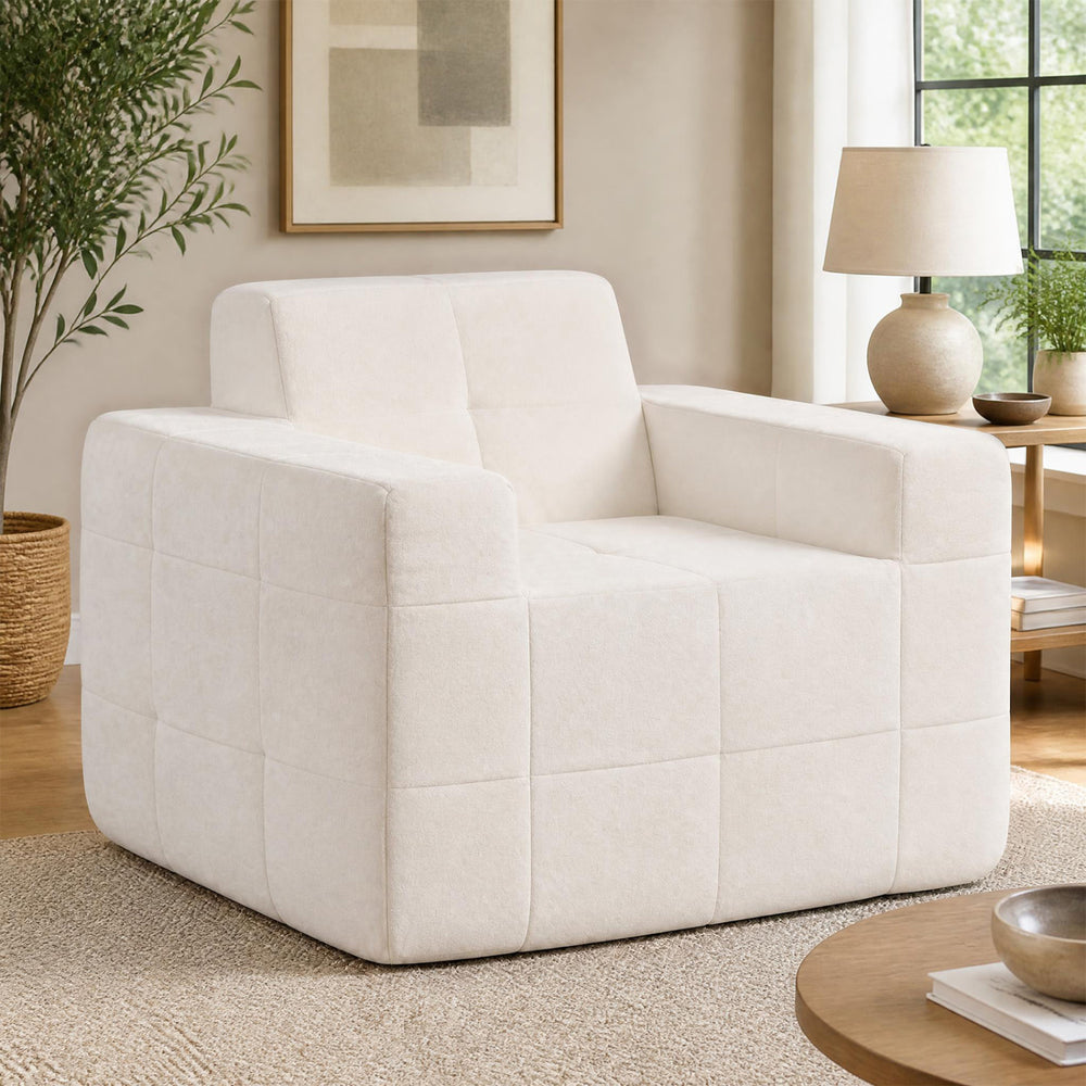 Boneless single sofa chair in soft terry cloth features grid stitching and extra-deep seating for ultimate relaxation.