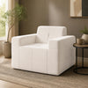 Boneless single sofa chair in soft terry cloth features grid stitching, extra-deep seating, and widened armrests for comfort.