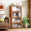 4-tier bamboo bookcase with see-through doors, perfect for displaying books and decor in a living room or study.