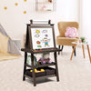 Double-sided brown art easel with magnetic whiteboard, chalkboard, and storage for kids' art supplies in playroom.