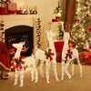 Three-piece pre-lit Christmas reindeer family with 230 warm white LED lights, perfect for festive indoor or outdoor.