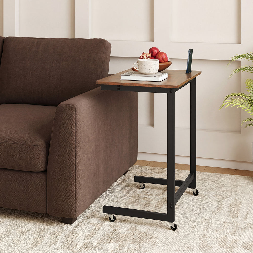C-shaped end table with wheels in rustic brown, featuring a spacious tabletop and built-in phone slot for convenient.