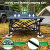 Camping cot with a heavy-duty metal frame and soft padded mat, designed for stability and easy transport for outdoor use.