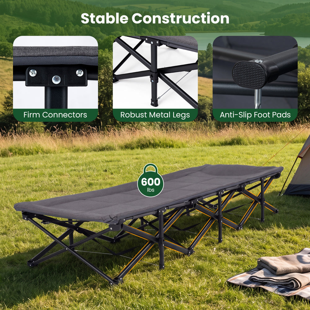 Camping cot in gray with padded pillow, robust metal legs, and side storage pouch for convenient outdoor relaxation.