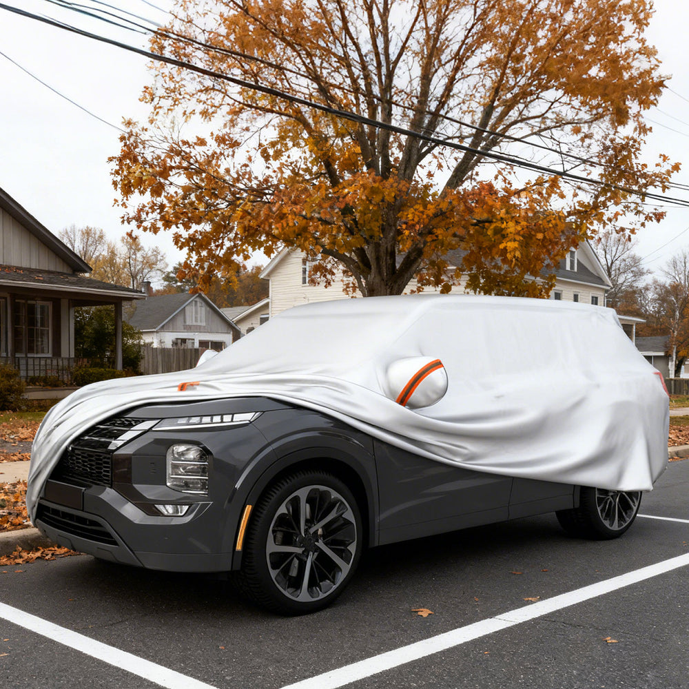 Car cover for SUVs up to 190 inches, providing UV, rain, and dust protection with a soft cotton lining and mirror.