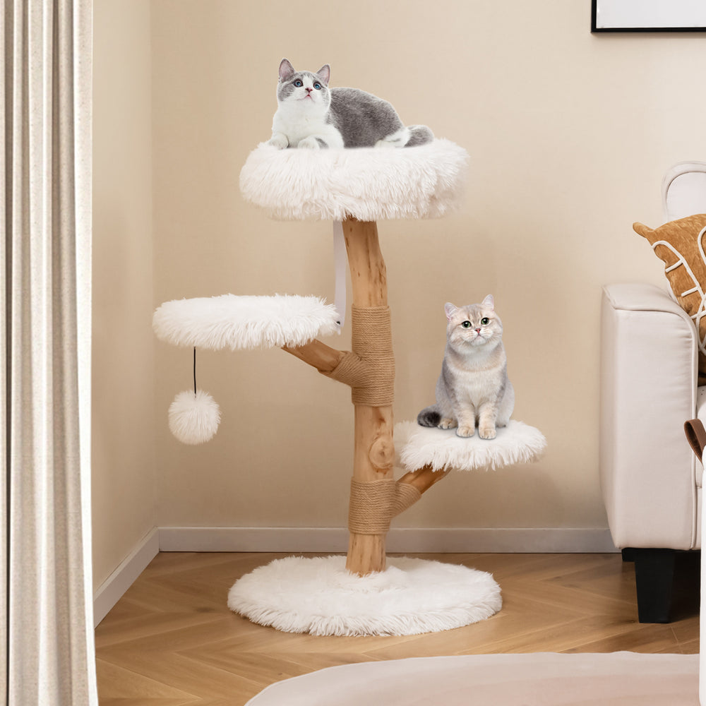 Cat tree made of solid pear wood with plush white perches and natural jute scratching posts for playful cats.