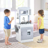 Kids playing with the Chef Pretend Kitchen Playset featuring a stove, sink, and ice dispenser for imaginative fun.