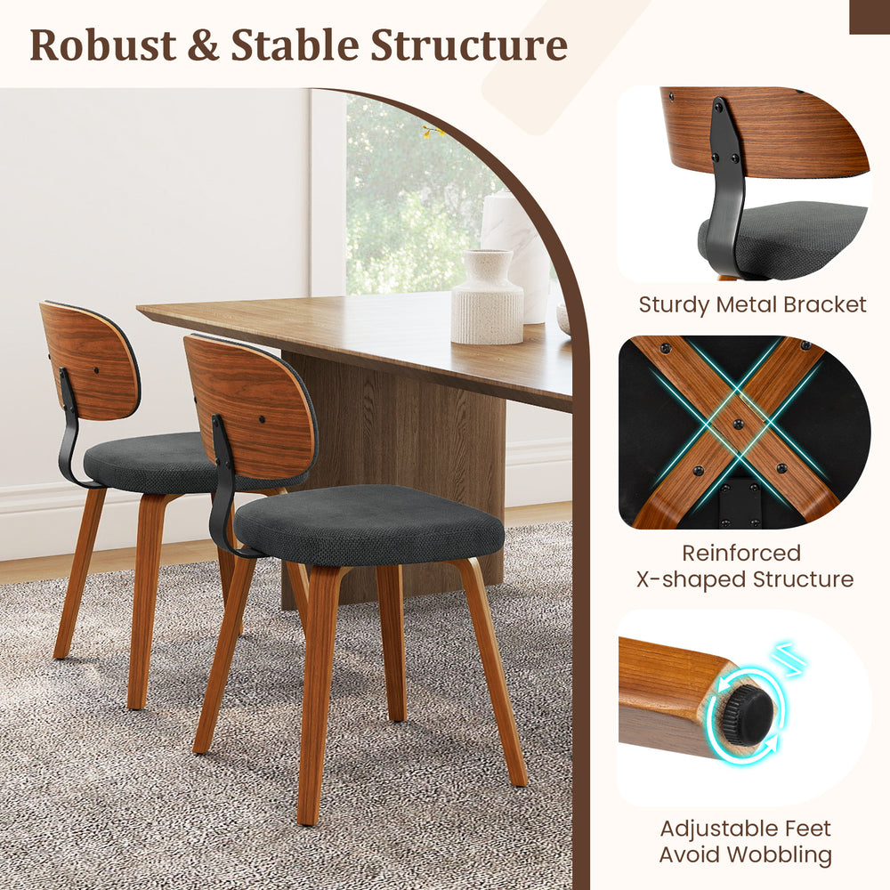 Set of 4 dark gray chenille fabric upholstered wooden kitchen chairs with ergonomic backrest and sturdy metal bracket.