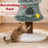 Christmas cat tree with scratching post and condos, featuring a plush green surface and festive decorative stars.