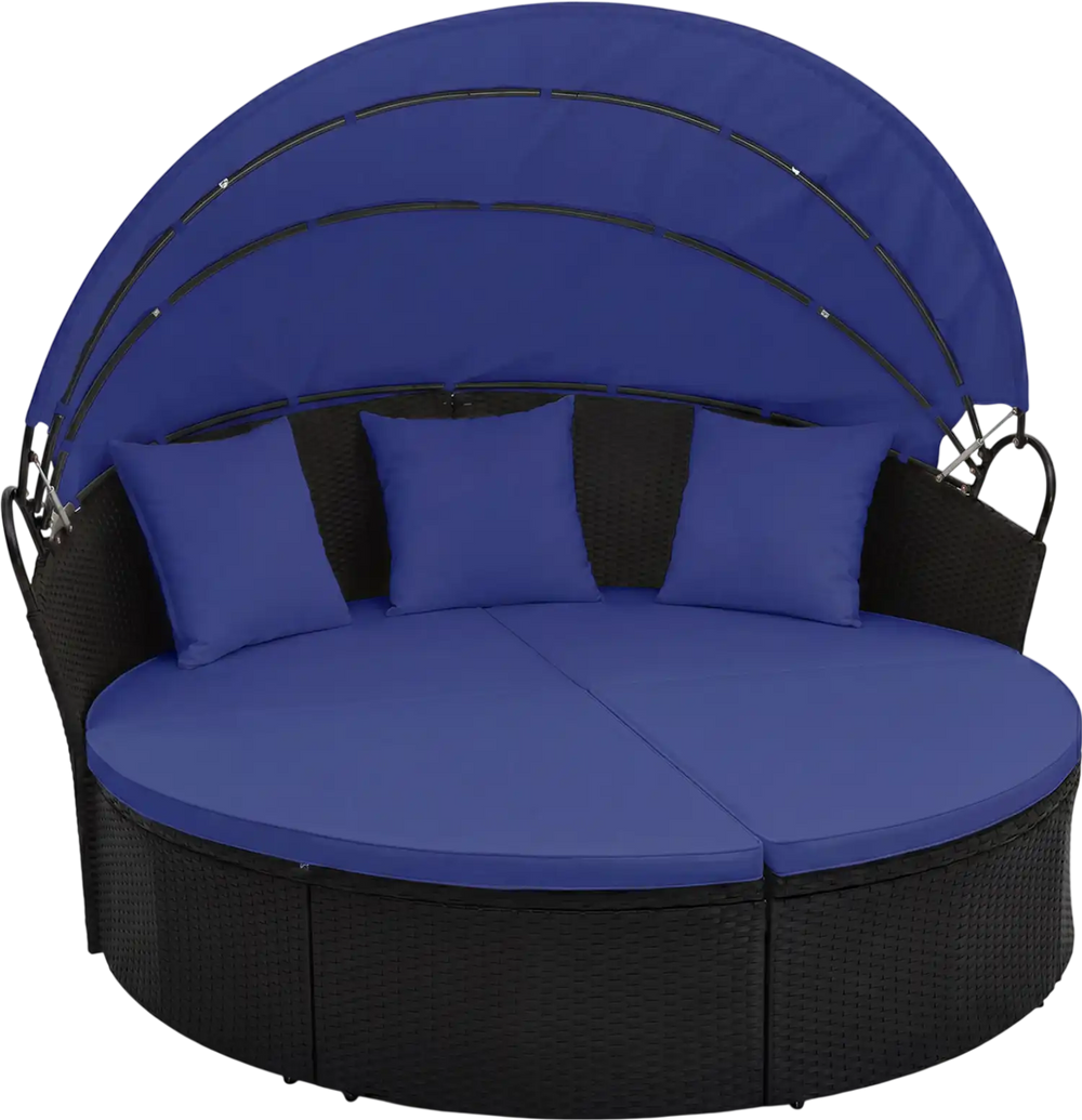 Round wicker patio daybed with retractable blue canopy and cushions, perfect for outdoor relaxation.