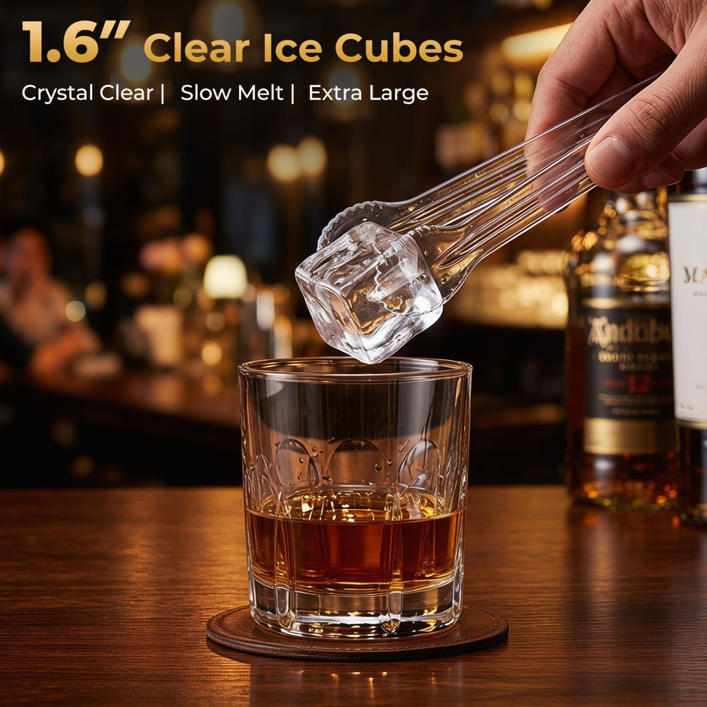 Clear 1.6-inch ice cubes produced by the countertop maker, ideal for premium drinks without dilution.