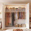 Wall-mounted closet shelf with hanging rod, featuring metal wire construction for laundry room organization and airflow.