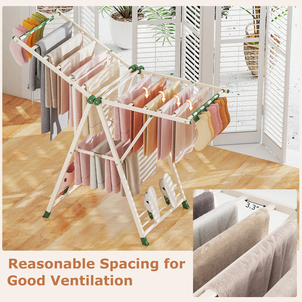 Clothes drying rack in beige with height adjustable wings, featuring 28 clips and 4 shoe holders for efficient drying.