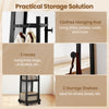 Freestanding coat rack with full-length mirror, 3 hooks, and 2 storage shelves for shoes and bags in walnut finish.