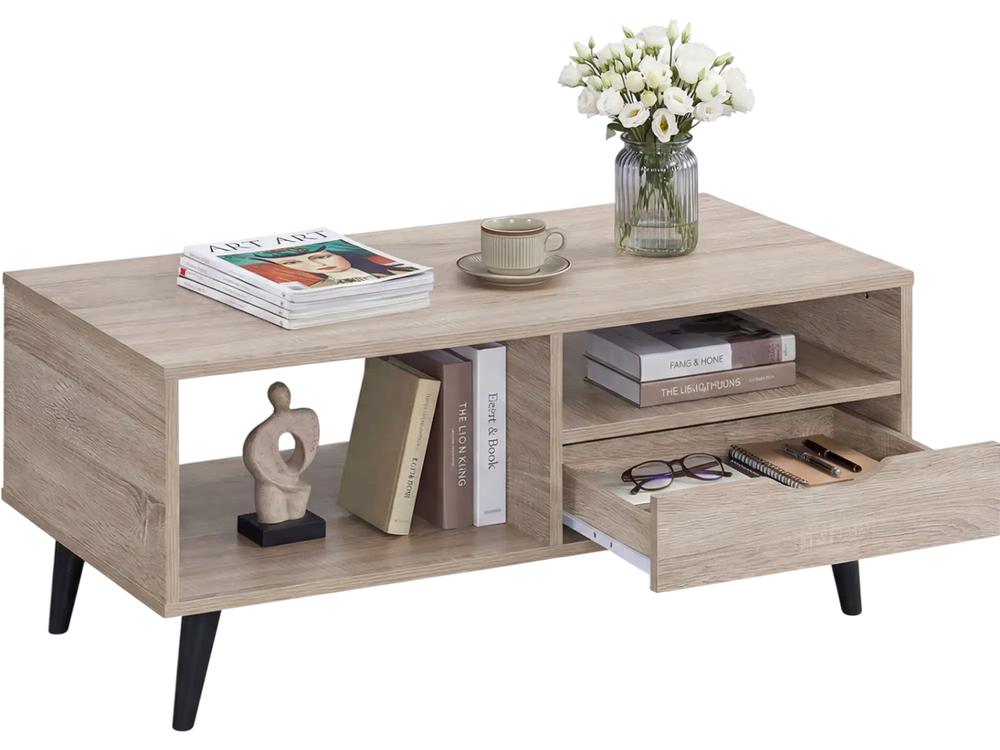 Rustic rectangle coffee table highlighting a smooth drawer operation and stylish splayed support legs for modern living.