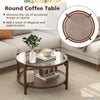 Round coffee table featuring a tempered glass top and a hand-woven rattan shelf, adding a rustic charm to your living.