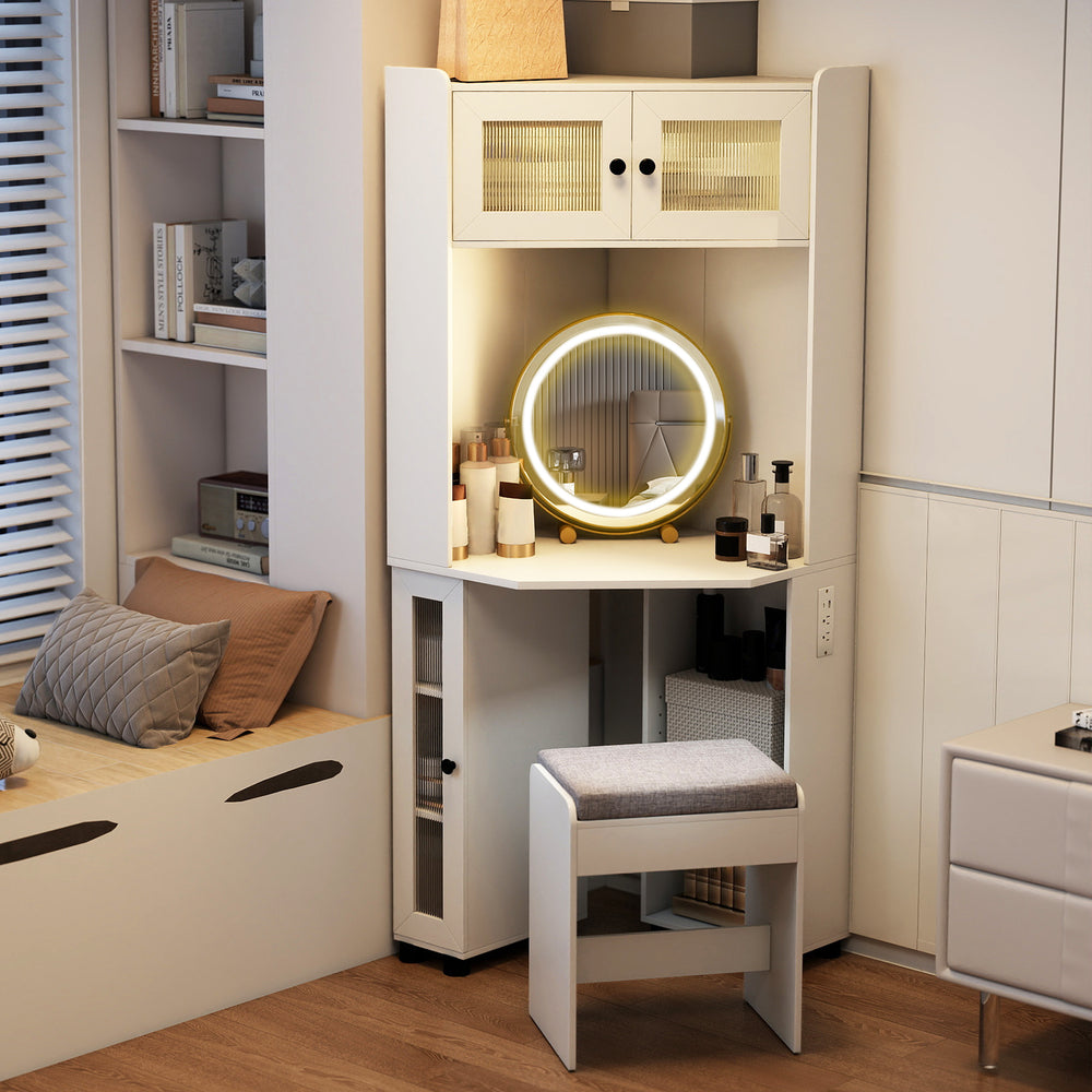 Compact corner vanity desk in white with a 360° rotating mirror, lights, and cushioned stool for elegant storage.