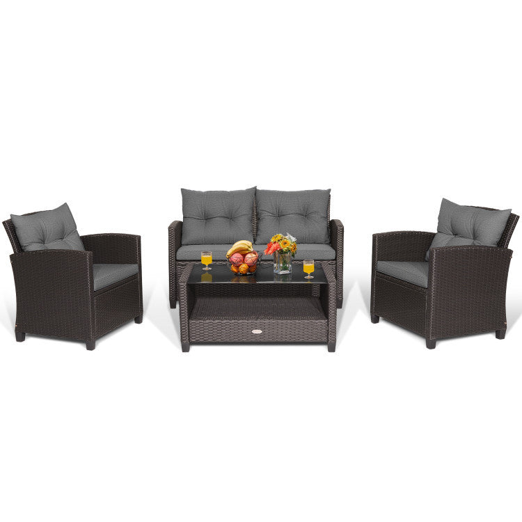 Four-piece patio conversation set featuring a loveseat and two chairs with gray cushions, perfect for outdoor lounging.