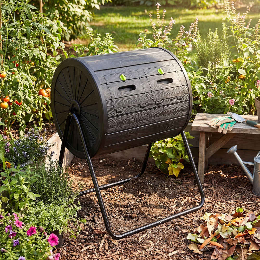 Compost tumbler with dual chambers, 37.5-gallon capacity, and a sturdy metal frame for efficient outdoor composting.