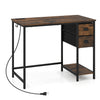Computer desk in rustic brown with charging station, two fabric drawers, and metal frame for small spaces.